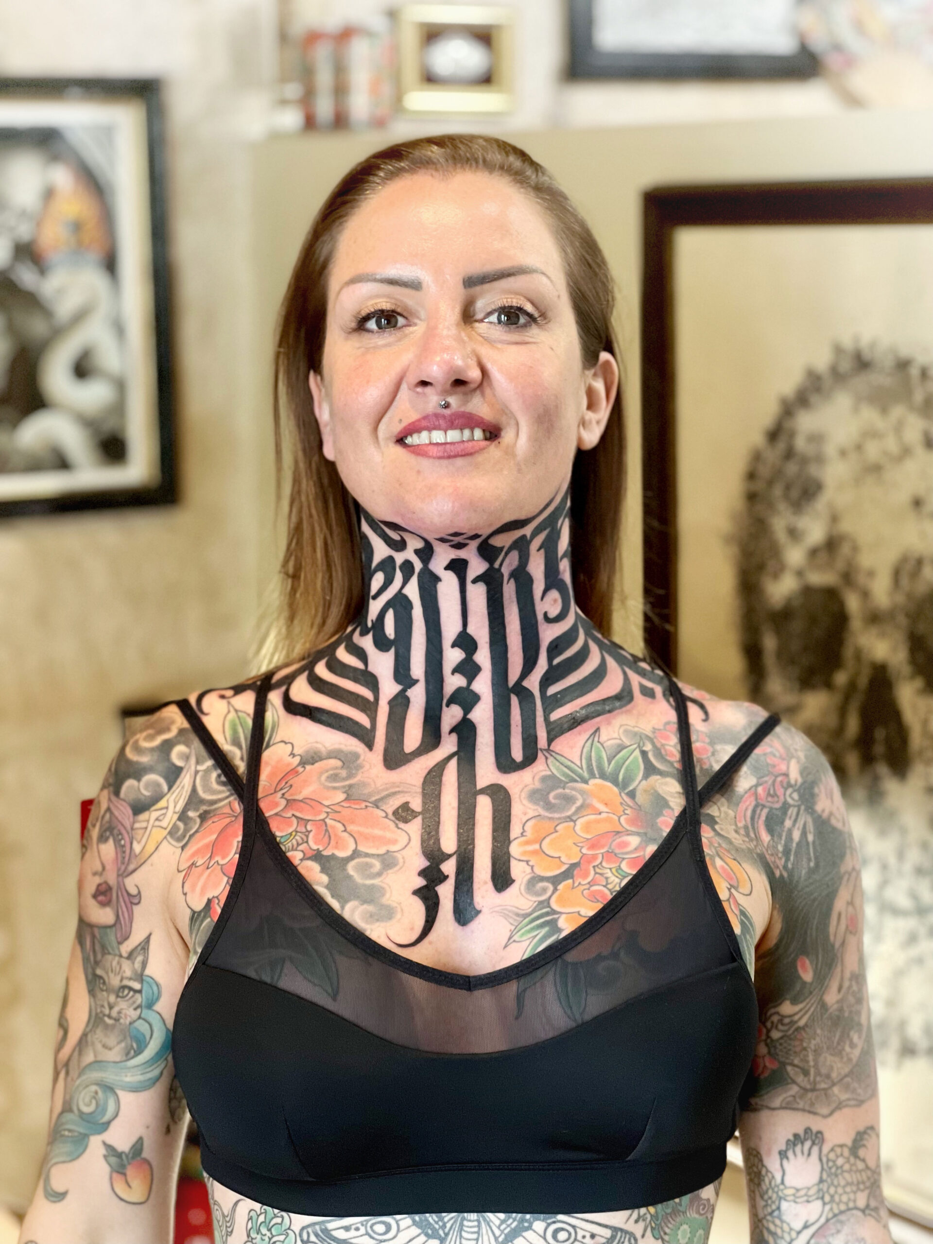 Symmetrical neck tattoo with flowers  Neck tattoo Flower tattoos  Polynesian tattoo